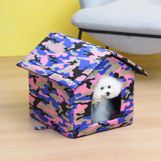 Camouflage-patterned pet bed with a small white dog peeking out on a large fluffy white rug.

