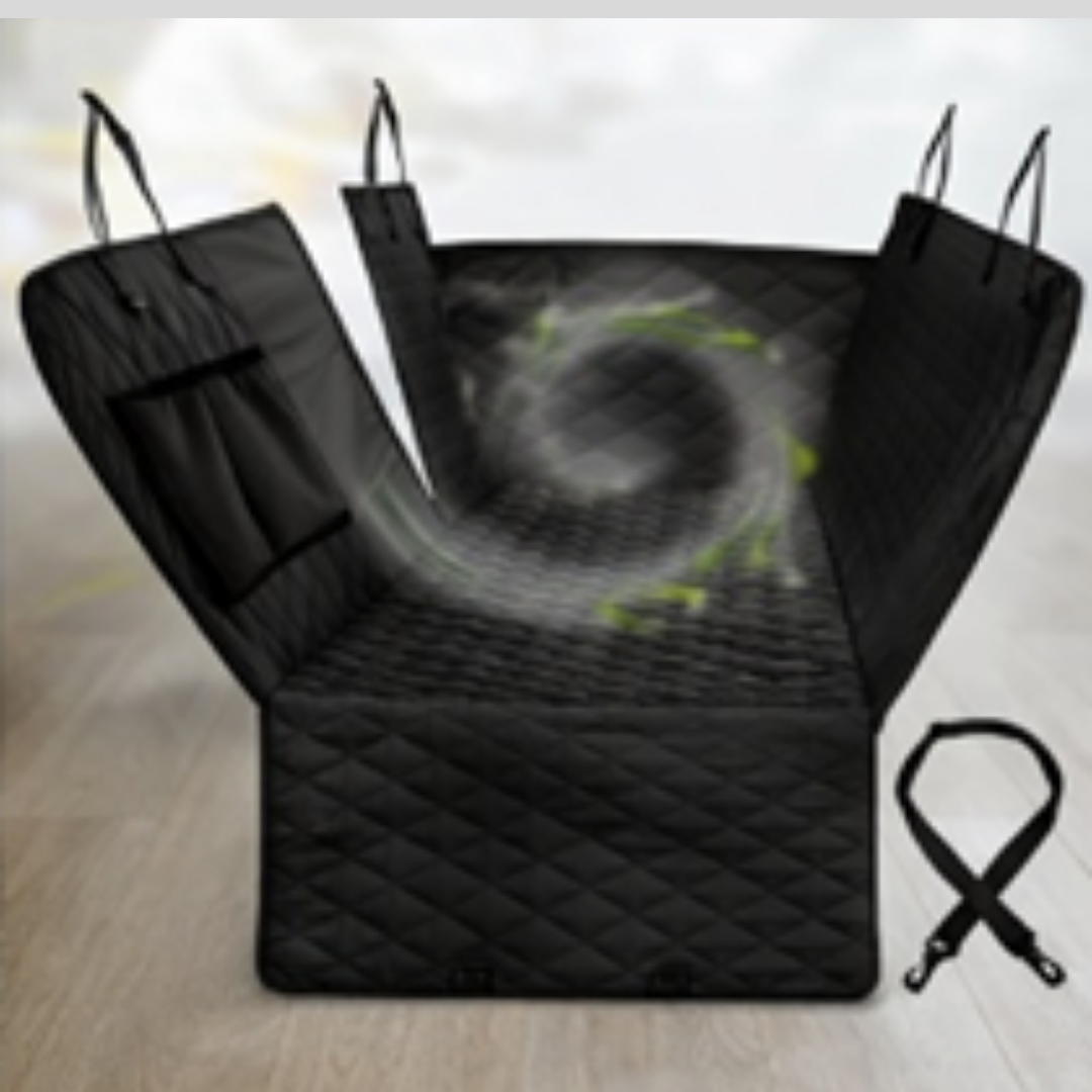 Black car seat cover with straps on a light wooden floor